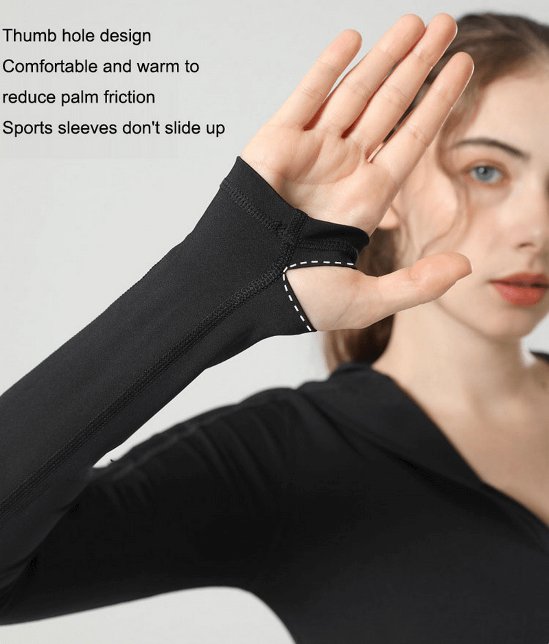 Woman wearing stylish long-sleeve sports top with thumb hole design, hood; perfect for comfortable yoga workouts. SF1430